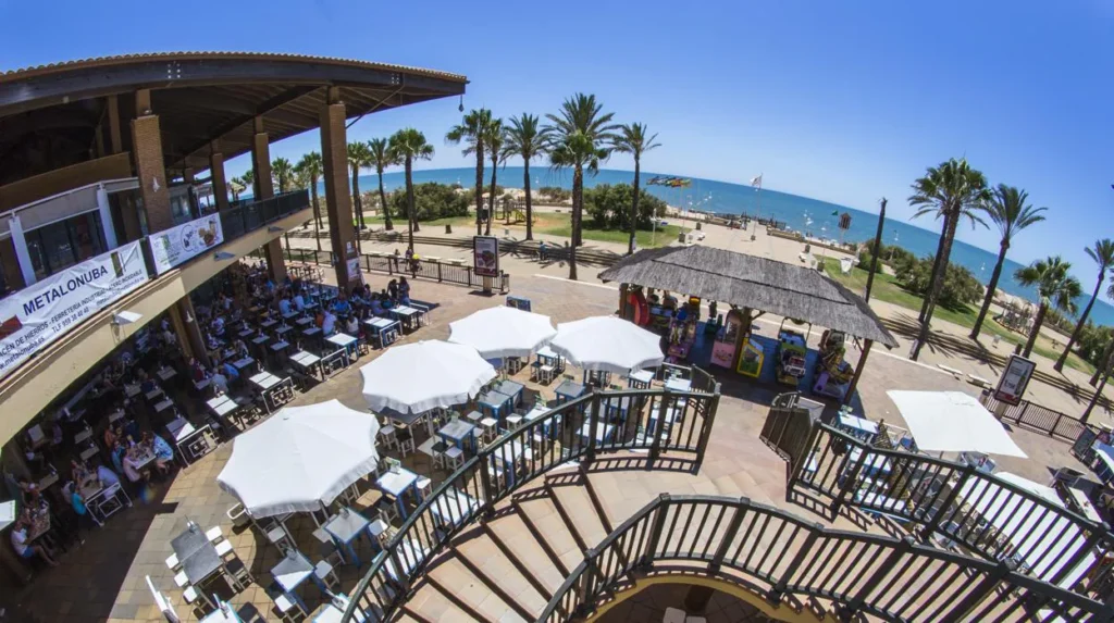 Families browsing shops in the Islantilla Shopping Center